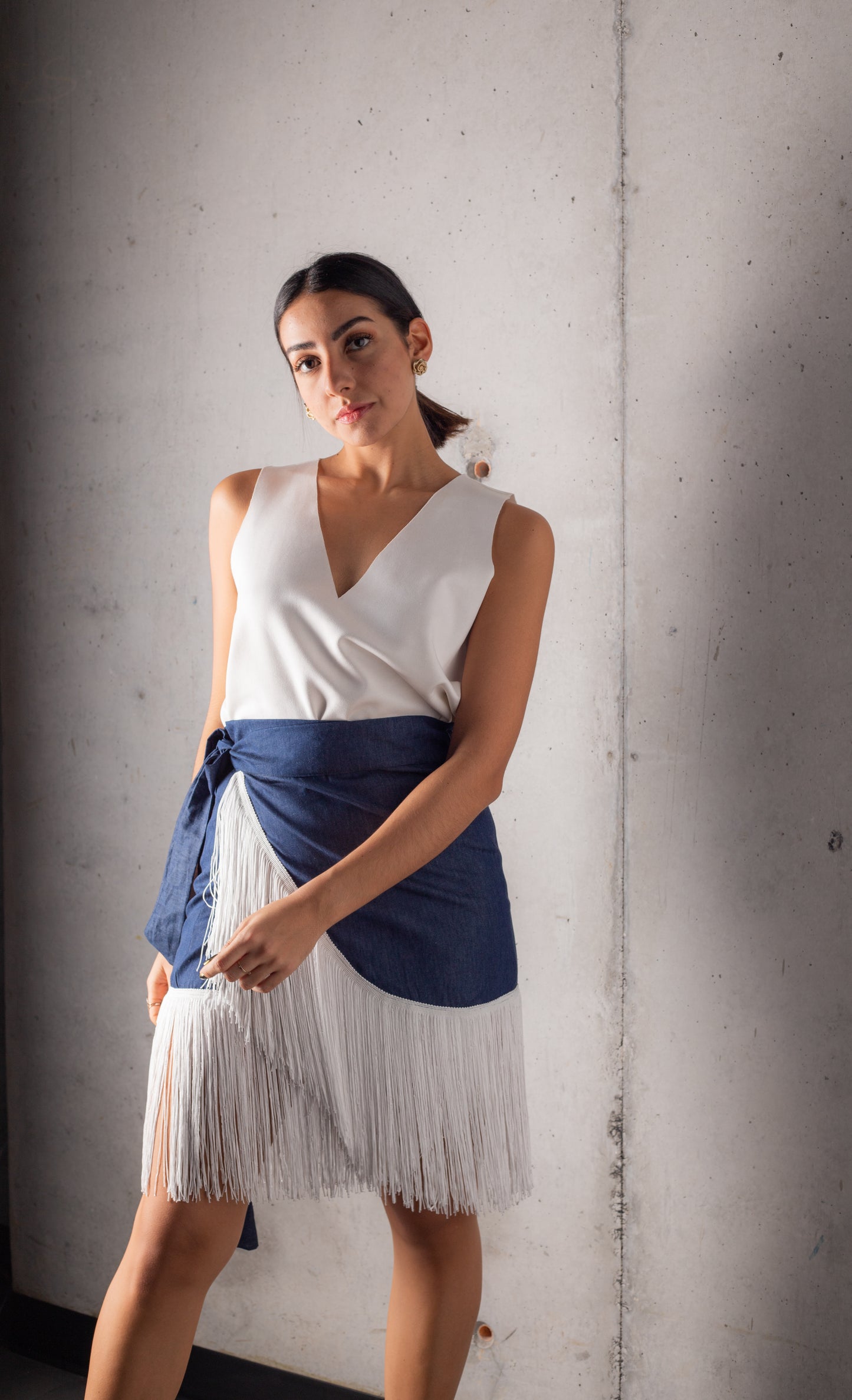 Denim falda con flecos