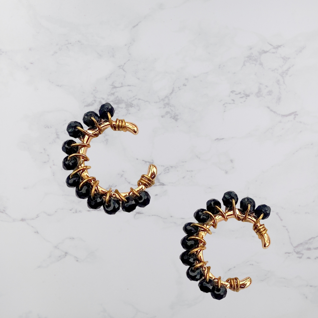 Ear cuff negro tornasol